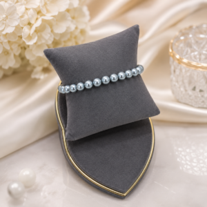 Steel grey pearl bracelet featuring glossy round pearls in a classic stretch bracelet design for women.