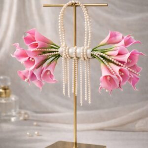 Blush calla lily pearl bow bouquet with cascading pearls